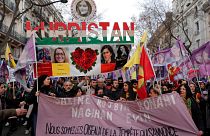 Kurdish activists march during a protest in Paris, Saturday, Jan. 7, 2023