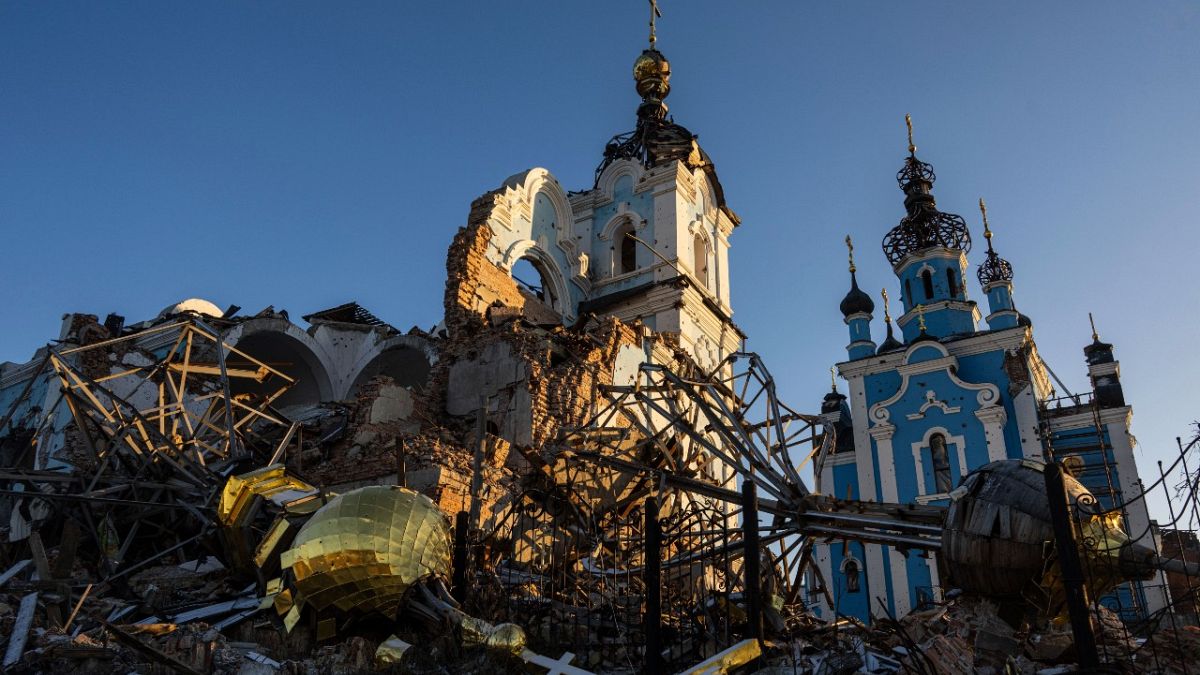 A cupola lies on the ground in front of the Orthodox Church which was destroyed by Russian forces in the recently retaken village of Bogorodychne, Ukraine, Saturday, Jan 7, 23