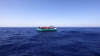 African migrants on a rubber boat 