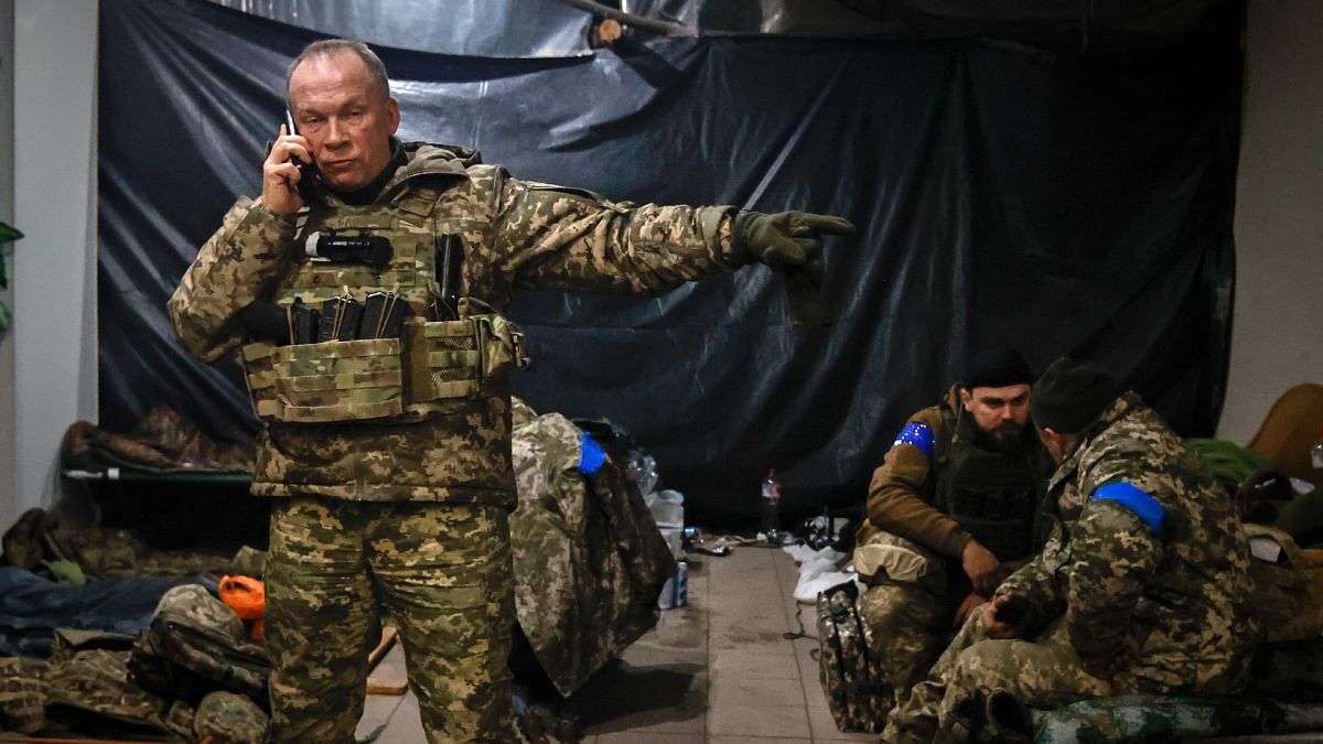 Commander of the Ukrainian army, Col. Gen. Oleksandr Syrskyi, gives instructions in a shelter in Soledar, the site of heavy battles with the Russian forces, near Donetsk.