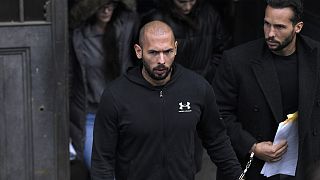 Andrew Tate and his brother Tristan leave after appearing at the Court of Appeal, in Bucharest, 10 January 2023