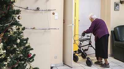 A retirement home resident walks in a public EHPAD housing establishment in Saint-Sulpice-La-Pointe, southern France, 4 January 2023