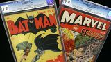 Batman #1, left, and Marvel Mystery Comics #9 are shown at Heritage Auction Galleries, in Dallas. 