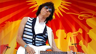 FILE - Guitarist Jeff Beck performs at the Louisiana Jazz and Heritage Festival in New Orleans on April 29, 2011