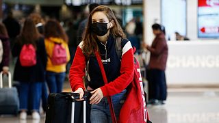 New COVID-19 variants have led the WHO to recommend wearing masks on long-haul flights.