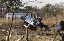 An SUV is overturned near 1349 County Road 43 in the aftermath from severe weather. Thursday, 12 January 2023, in Prattville, Alabama.
