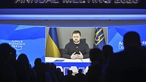  Ukrainian President Volodymyr Zelenskyy of Ukraine talks from a video screen to participants at the World Economic Forum in Davos, Switzerland.