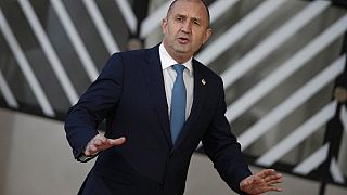 Bulgaria's President Rumen Radev speaks with the media as he arrives for an EU summit in Brussels, Thursday, Dec. 15, 2022. 