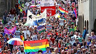 Thousands of people march down Edinburgh's Royal Mile to mark the city's 21st Pride festival, Saturday July 2, 2016.