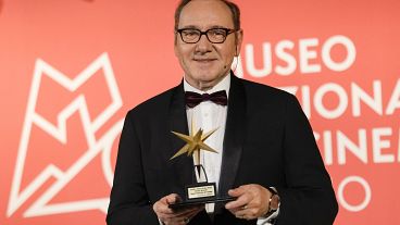 Actor Kevin Spacey poses with his Lifetime Achievement Award at the National Museum of Cinema in Turin - Monday 16 Jan.
