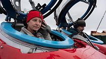 Dr Susanne Lockhart and John Hocevar prepare for a dive off Half Moon Island, Antarctica.