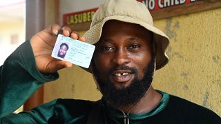 Nigeria's first-time voters flock to get voting cards ahead of election