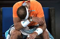 Spain's Rafael Nadal reacts during his second-round loss to Mackenzie McDonald of the US at the Australian Open tennis championship in Melbourne, 18 January 2023