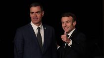 French Presidence Emmanuel Macron, right, and Spain's Prime Minister Pedro Sanchez after a joint news conference at the EU-Med9 summit in Alicante, Spain, Dec. 9, 2022. 