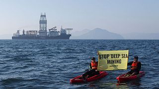 Greenpeace activists from New Zealand and Mexico confront the deep sea mining vessel Hidden Gem, commissioned by Canadian miner The Metals Company in November 2022.