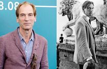 Julian Sands, pictured at the Venice Film Festival 2019 (left) - in A Room With a View (1985 - right)
