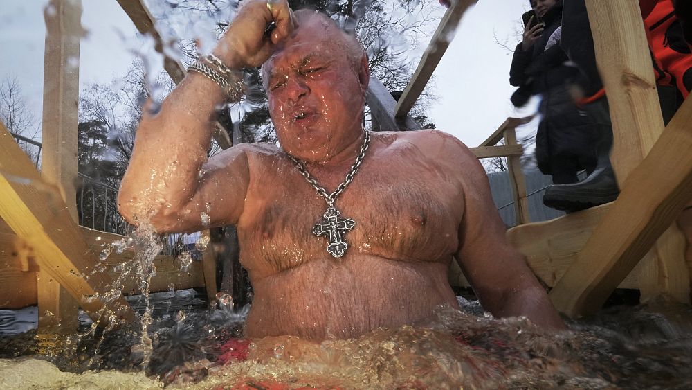 Watch: Russians plunge into freezing water to celebrate Epiphany