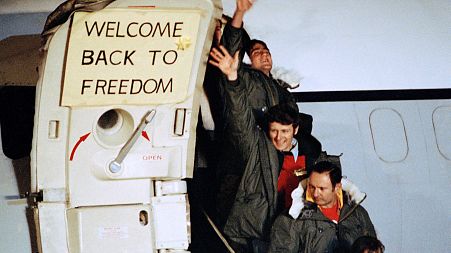 Unidentified U.S. hostages arrive at Rhein-Main U.S. Air Force base in Frankfurt, West Germany after their release from Iran, January 21, 1981.