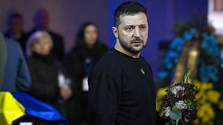 Ukrainian President Volodymyr Zelenskyy at the funeral of victims of Wednesday's helicopter crash.