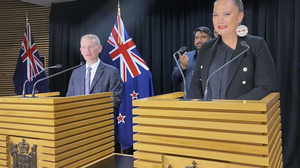 Chris Hipkins, left, and Carmel Sepuloni hold a press conference at Parliament in Wellington, Sunday, Jan. 22, 2023.