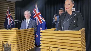 Chris Hipkins, left, and Carmel Sepuloni hold a press conference at Parliament in Wellington, Sunday, Jan. 22, 2023.