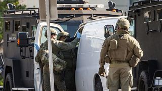 An hours-long manhunt led police to surround and enter the van where the suspect shot himself, according to authorities.