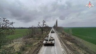 Russian Army T-90M tanks roll to their position at an undisclosed location in Ukraine. 