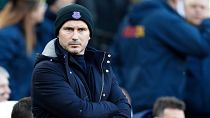 Everton's manager Frank Lampard looks on before the English Premier League soccer match between West Ham United and Everton at the London Stadium in London, Jan. 21, 2023.