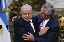 Brazilian President Luiz Inacio Lula da Silva, left, and Argentina's President Alberto Fernandez embrace at the government house in Buenos Aires, Argentina, Monday, Jan. 23