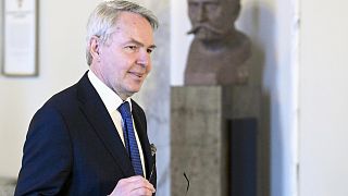 Finland's Foreign Minister Pekka Haavisto arrives for a news conference at the Parliament building in Helsinki, Finland, Tuesday, Jan. 24, 2023.