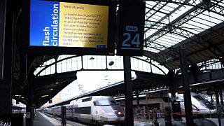 A photo shows a screen displaying a traffic alert message at a platform entrance during a total traffic shutdown at the Gare de l'Est train station in Paris on January 24, 202