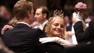 Professional dancers glide to the Wiener Waltz during the opening of the celebrated Opera Ball in Vienna