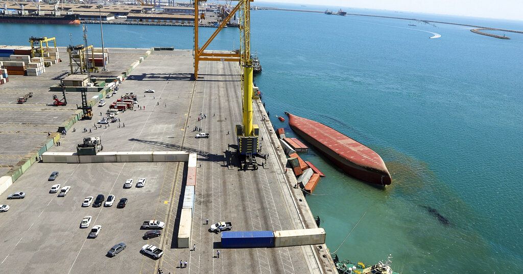 Tanzanian cargo ship overturns in Iranian port thumbnail
