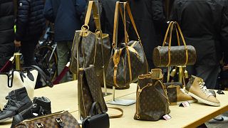 Louis Vuitton shoes and bags are presented at the Economy Ministry in Paris, where Agrasc sells goods from seizures and judicial confiscations 