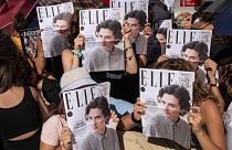 Fans congregate in front of the red carpet ahead of the film premiere of "Bones and All," which stars Timothee Chalamet