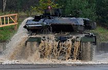 A soldier in a Leopard 2 A7  at the military training area in Munster, northern Germany, on October 13, 2017.