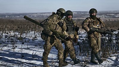 Ukrainian soldiers on their positions in the frontline near Soledar, Donetsk region, Ukraine, Wednesday, Jan. 11, 2023.