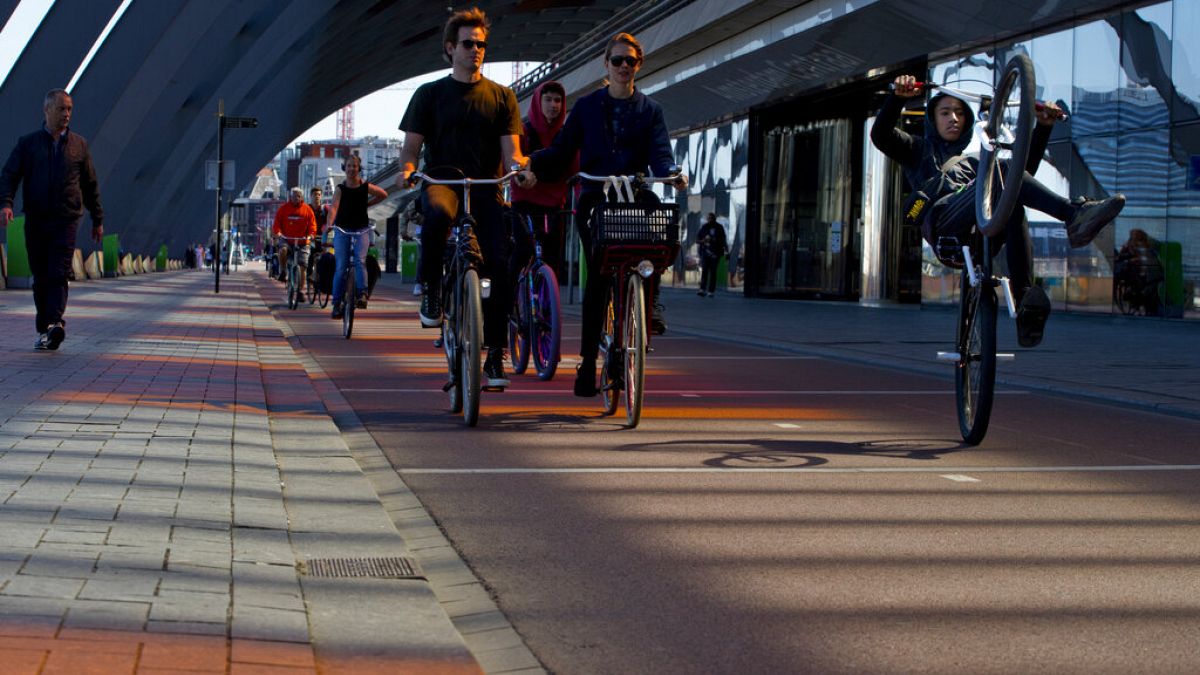 People cycling in Amsterdam, Netherlands in April 2020.