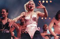 Pop singer Madonna performs during her Blond Ambition tour in Worcester, Mass., on June 4, 1990.
