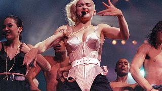 Pop singer Madonna performs during her Blond Ambition tour in Worcester, Mass., on June 4, 1990.