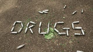 A pile of laughing gas cans arranged exactly as the UK government expects