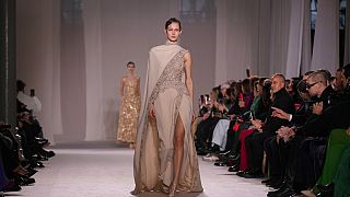 A model wears an Elie Saab creation as part of his Haute Couture Spring Summer 23 collection