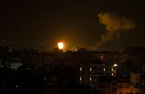 Fire and smoke rises following an Israeli airstrike in central Gaza Strip.