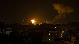 Fire and smoke rises following an Israeli airstrike in central Gaza Strip.