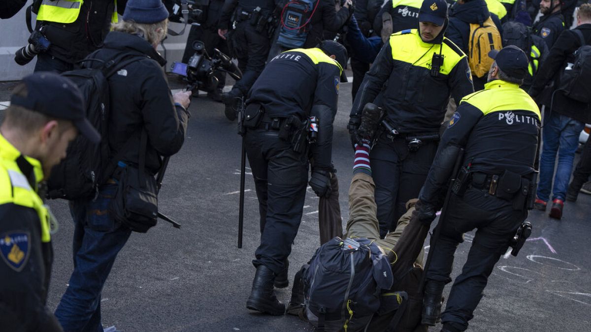 Dutch authorities arrest protesters after climate activists blocked ...