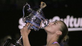 Aryna Sabalenka of Belarus holds the Daphne Akhurst Memorial Trophy after winning in the women's singles final at the Australian Open in Melbourne, 28 January 2023