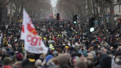 FILE - Protestors march during a demonstration against pension changes, Thursday, Jan. 19, 2023 in Paris. 