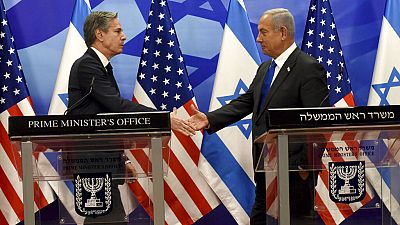 US Secretary of State Anthony Blinken and Israeli Prime Minister Benjamin Netanyahu shake hands after their meeting at the Prime Minister's Office in Jerusalem.