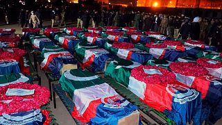 Photo released by Pakistan's Police Department - security officials gather for funeral prayers of police officers who were killed in the suicide bombing