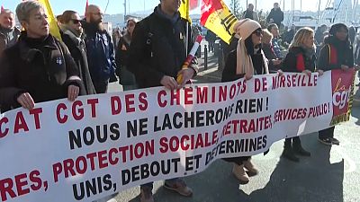 French workers in Marseille protest over the government's pensions reforms